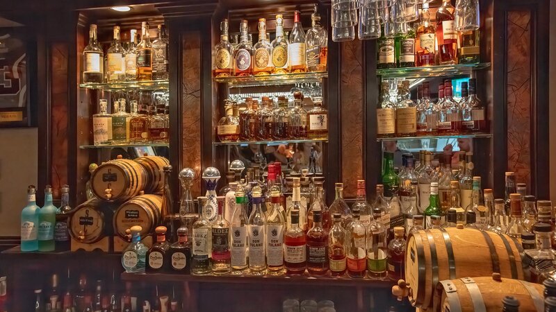 Bar with many types of bottled liquor
